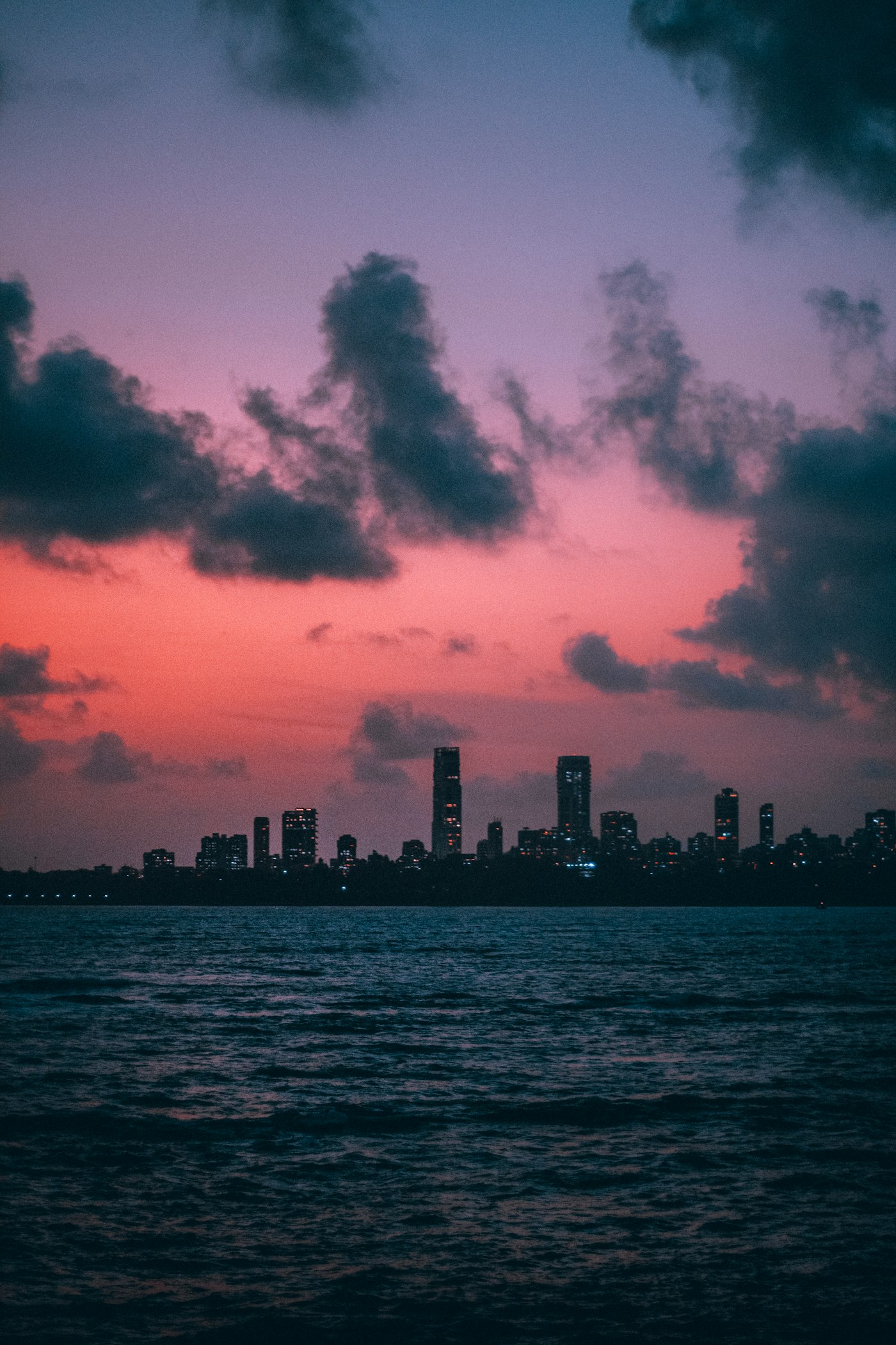 Mumbai skyline at sunset seen from Marine Drive