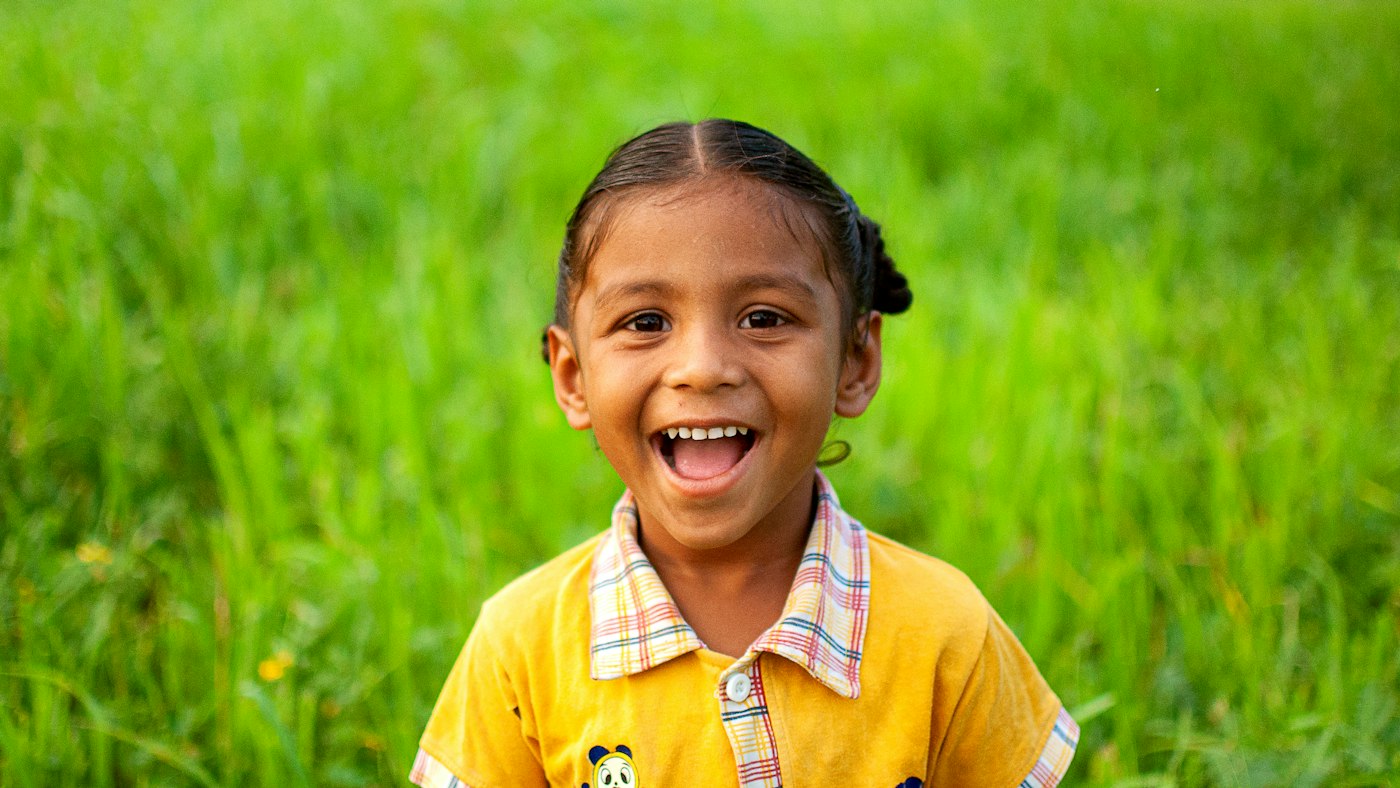 A young boy brushing his teeth