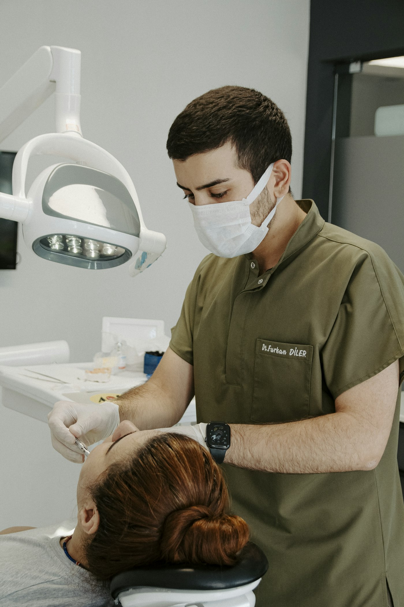 Dentist examining a patient at a modern dental clinic in India