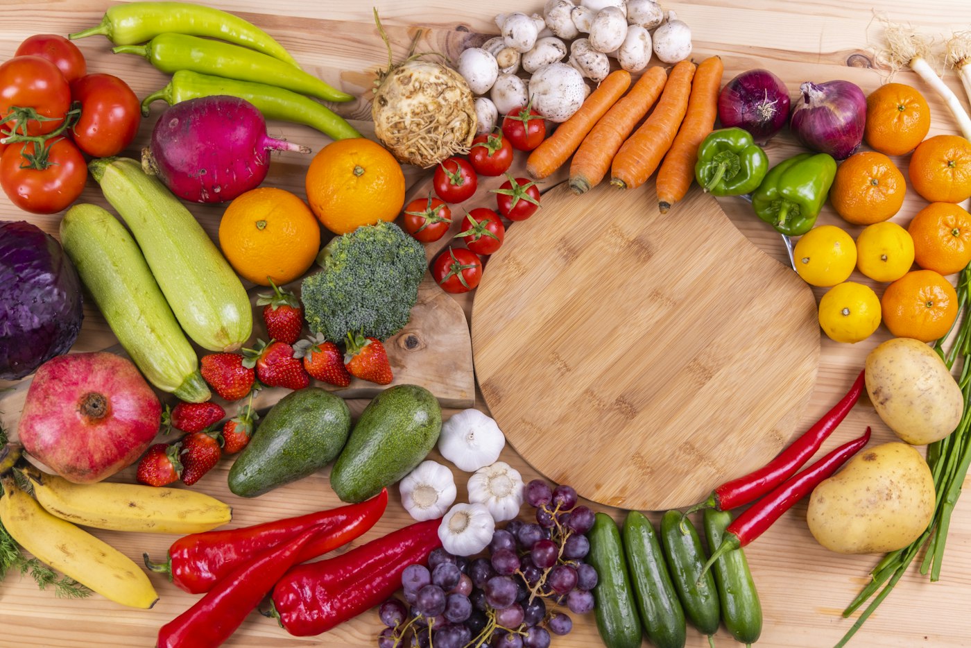 Fresh fruits and vegetables on a board