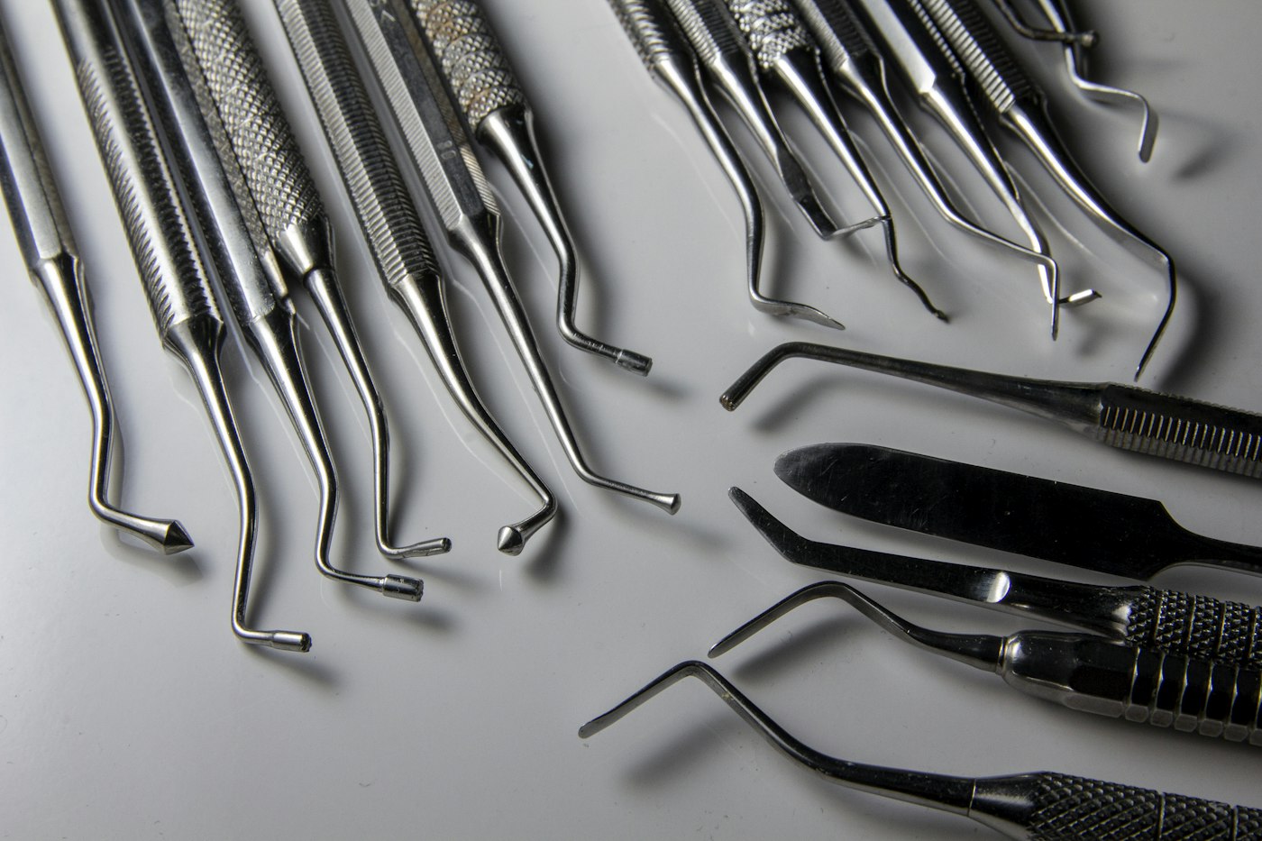 Dental surgical instruments laid out on a table
